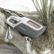 Illustration for article titled Trail Tune Carabiner Radio Clips on Just About Anywhere